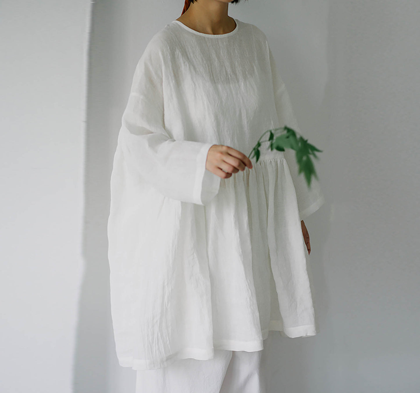 edoa Linen Peplum Blouse with Ruffled Hem