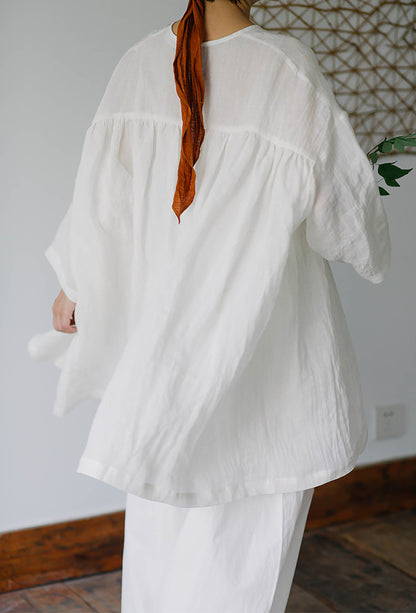 edoa Linen Peplum Blouse with Ruffled Hem