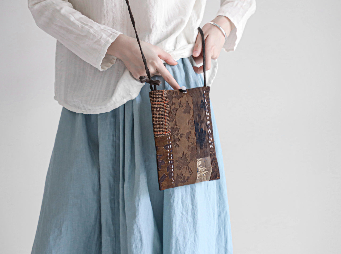 edoa mud silk crossbody bag