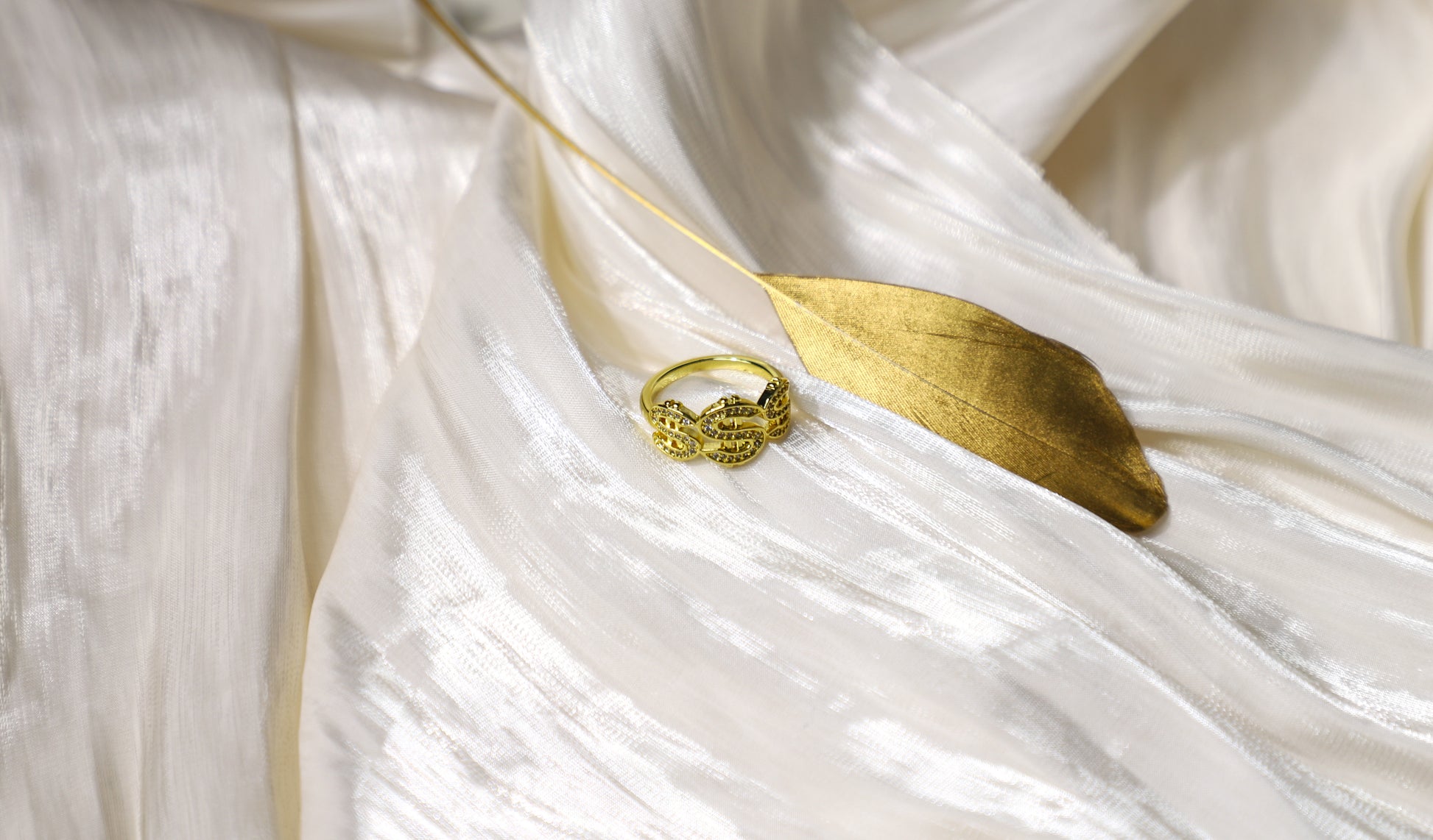 gold dollar sign ring